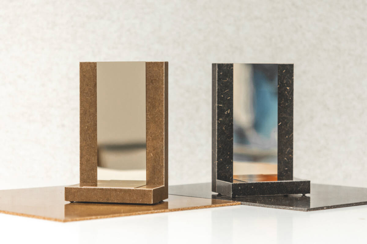 kairlin-kairos-mirror-brown-glass-black-biomaterial-innovation